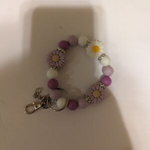 Purple daisy wristlet keychain